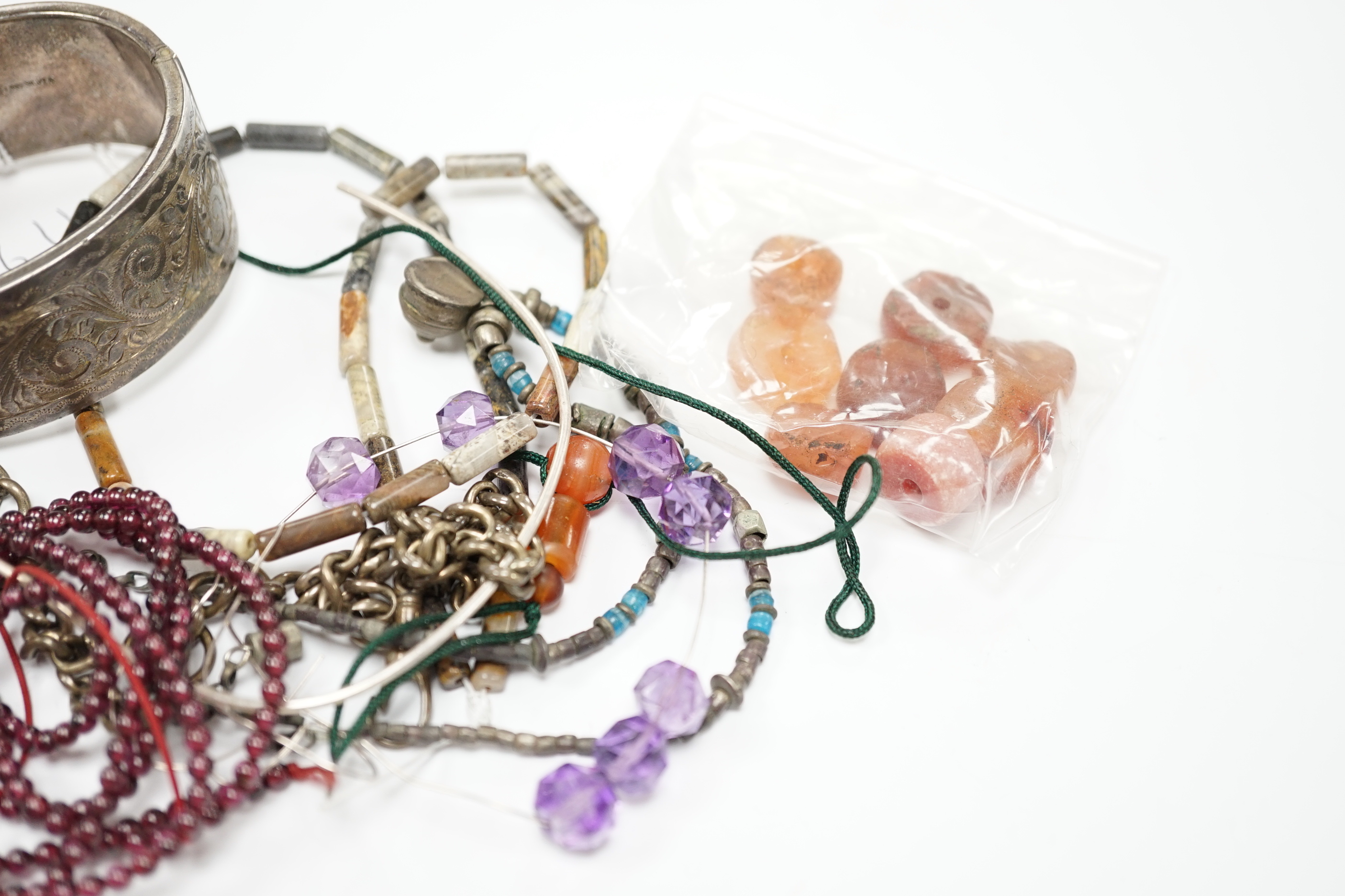 A modern silver hinged bangle and a quantity of mixed jewellery including fittings, bead necklaces, cufflinks, rings, silver albert etc.